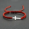 7dde2f3515538b7d638f8b7048195c5d_enhanced.webp Handwoven Cross Bracelet